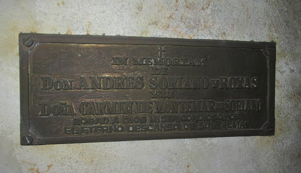 A bronze memorial plaque reading 'In Memoriam de Don Andres Soriano y Roxas y de Doña Carmen de Montemar de Soriano' at San Agustin Church in Intramuros, Manila