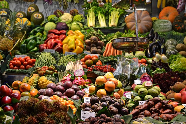 A Filipino public market stall stocked with fresh produce
