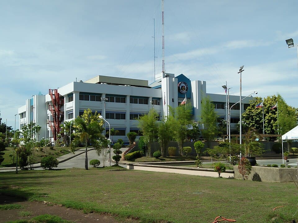 The white multi-storey Butuan City Hall in Agusan del Norte, a city government building in the Caraga Region, photographed in September 2018