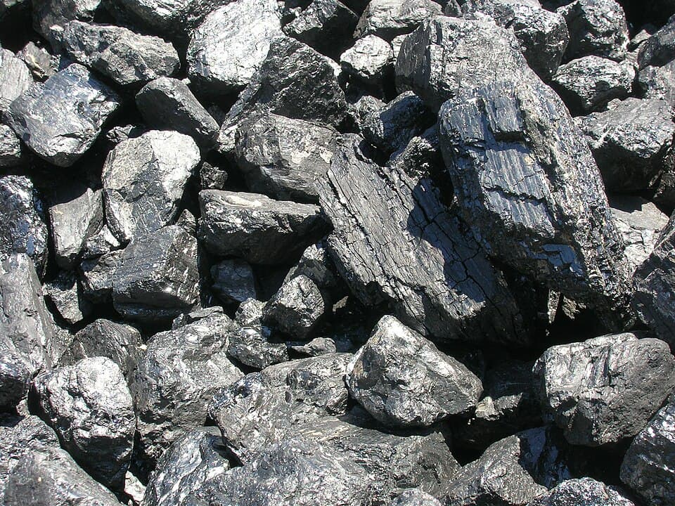 A close-up of large lumps of black coal piled together at a coal store in Jaromerice nad Rokytnou, Czech Republic