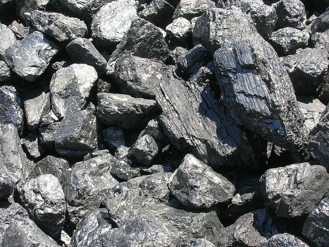 A close-up of large lumps of black coal piled together at a coal store in Jaromerice nad Rokytnou, Czech Republic